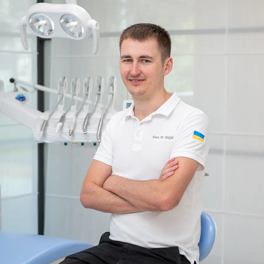 YOU-DENT dentist in white uniform